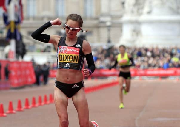 Alyson Dixon crosses the line during the 2016 Virgin Money London Marathon.