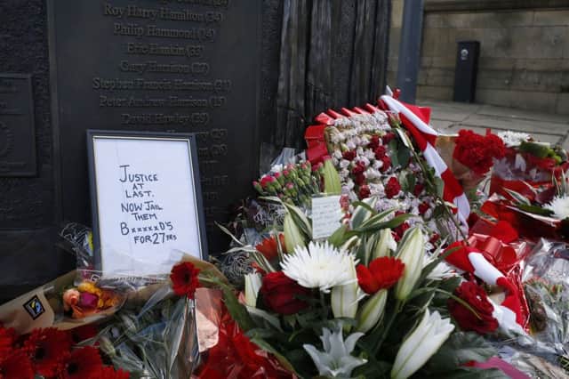Floral tributes left at a Hillsborough memorial