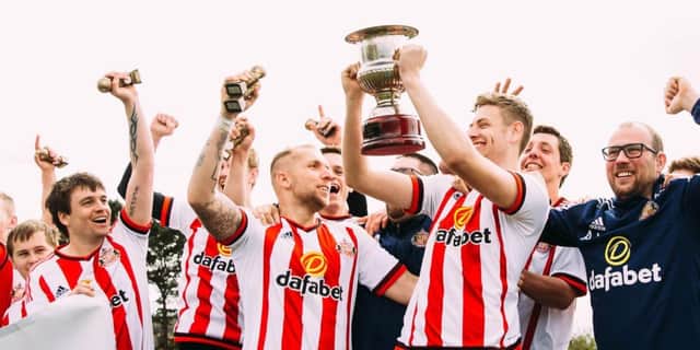 The Sunderland Deaf AFC players celebrate winning the England Deaf Football League Cup after a win over Reading. Pictures by Jason Steadman.