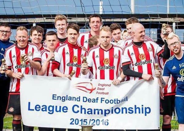 The Sunderland Deaf AFC players celebrate winning the England Deaf Football League Cup after a win over Reading. Pictures by Jason Steadman.