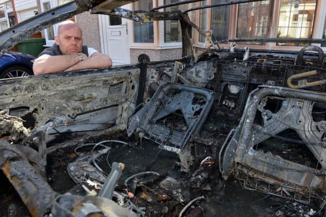 Suspected arson attack on Michael Brown's BMW car