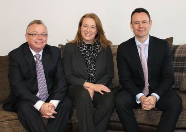 Kevin Royal, Managing Director, Marie Liston, Corporate Services Director, and Chris Muir, CFO