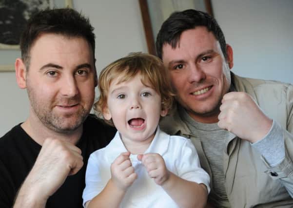 Chris Page and son Elliot, and charity event organiser Jonathan Hayes.