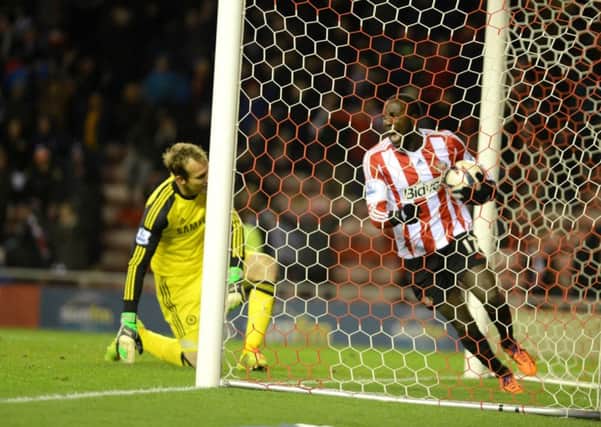 Jozy Alidore collects the ball from the back of the goal afer Ki Sung-Yueng's winner in Sunderland's Capital One Cup win over Chelsea in December, 2013