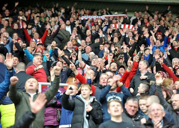 Sunderland fans celebrate Saturday's victory over Chelsea. Picture by Frank Reid