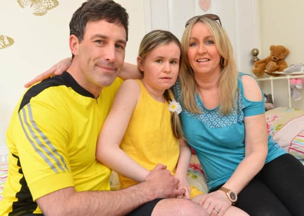 Mark Glendenning is doing a charity cycle ride for Rett UK.
He's pictured with partner Sandra Vincent and daughter Geena, who suffers from Rett.