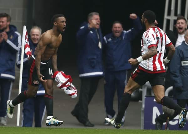 Sunderland's Jermain Defoe celebrates scoring his sides third goal during the Barclays Premier League match at the Stadium of Light. Photo credit should read: Owen Humphreys/PA Wire.