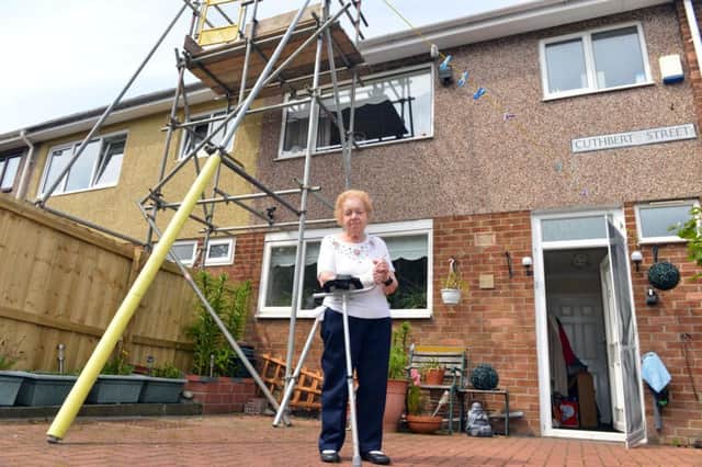 Evelyn Hannah is angry over scaffolding  which has been put on her property