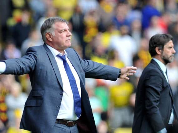 Sunderland manager Sam Allardyce and Watford boss Quique Sanchez Flores