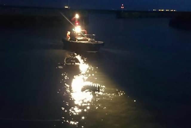 A boat is brought in during the rescue. Image by HM Coastguard.