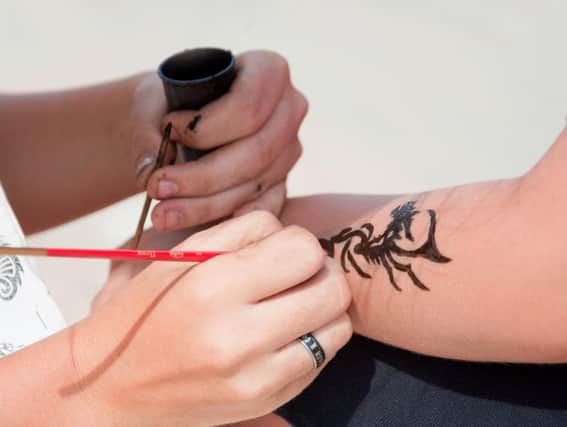 A 'black henna' temporary tattoo might seem like a good idea at the time.