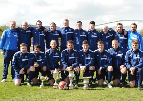 Quadruple winners Dawdon Welfare Park with their haul of trophies.