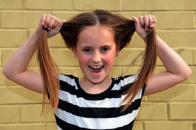 Mia Rose Smith, nine, has only ever had her hair trimmed.