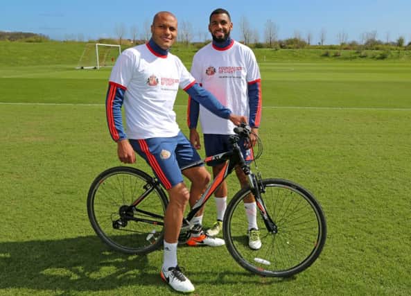 Sunderlands Younes Kaboul, left, and Yann MVila have backed a cycling challenge in their homeland, France.