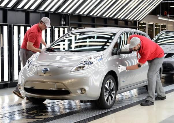 Workers on the production line at Nissan's Sunderland plant