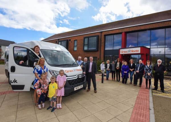The Chin4Jamie Ball in memory of the late Jamie Maclennan, has helped buy a mini-bus for Grace House, in Faber Road, Southwick, Sunderland, with help from Town Centre Citroen and O&H Conversions. Pictured are Jamie's mum Karen Maclennan (in cab) with her daughter Nichola and greand children Ruby (4), Charlie (3) and Harriet (6), Roger Quigley of O&H Conversions, Mark Johnston and Chris Sopp of Town Centre Citroen with staff and commitee members of Grace House, on Saturday.