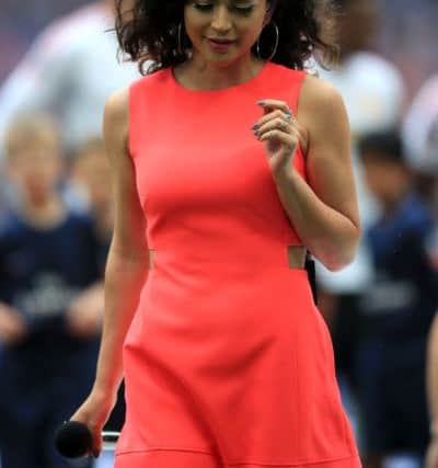 Singer Karen Harding after performing the national anthem during the Emirates FA Cup Final at Wembley Stadium.Photo credit: Nick Potts/PA Wire