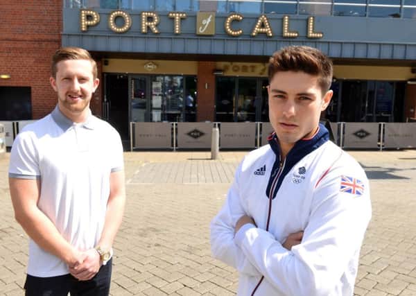 Olympic hopeful boxer Josh Kelly, right, with Port of Call manager Adam Dickman, who are now sponsoring the boxer.