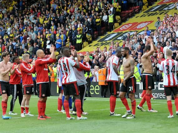 Sunderland players applaud the travelling supporters at Watford