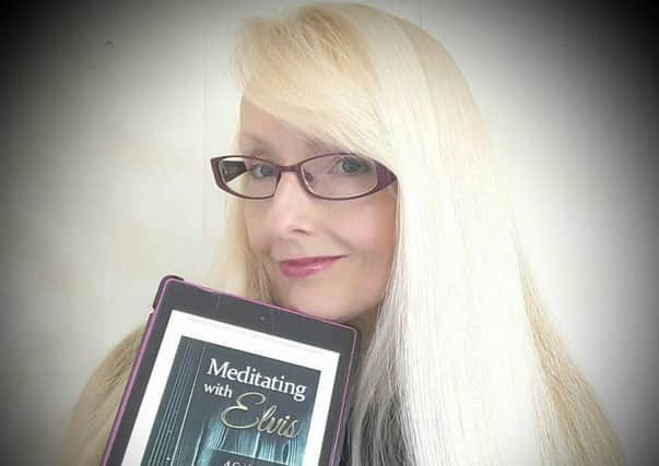 Annette Jeffrey with her new book, Meditating with Elvis.