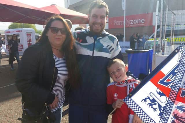 Jo Duffy with partner David Gardner and her son Cass Burdis in the Stadium of Light's Fan Zone ahead of the England v Australia friendly.