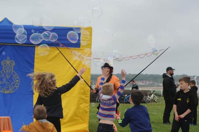 Sunderland Live's Best of British family fun day held at Bede's Cross, Roker - youngsters burst bubbles from Bubble Inc.