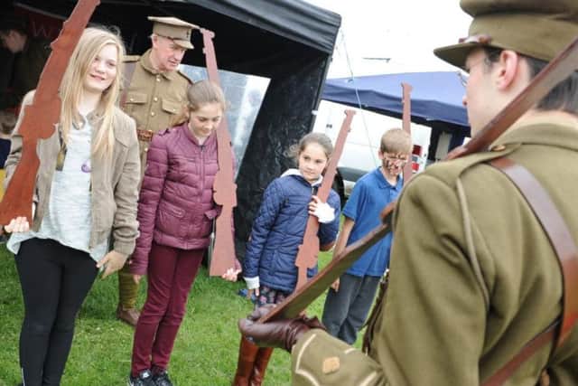 Sunderland Live's Best of British family fun day held at Bede's Cross, Roker - youngsters are drilled by Time Bandit's re-enactors.
