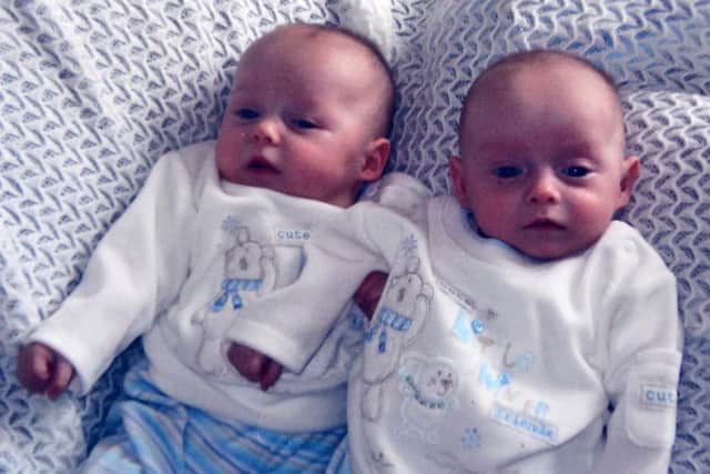 The twins as babies.
