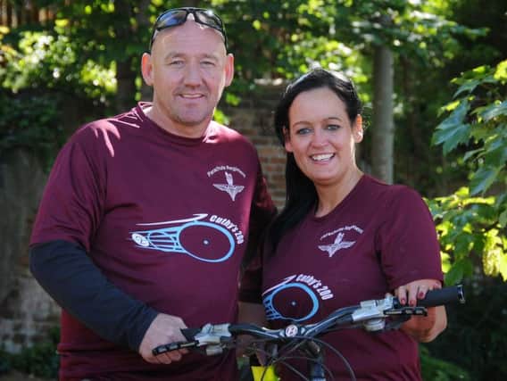 Tom and Carla Cuthbertson at the annual Cuthy's 200 bike ride, which takes place every year to remember Nathan and raise funds for Brothers in Arms and other causes.