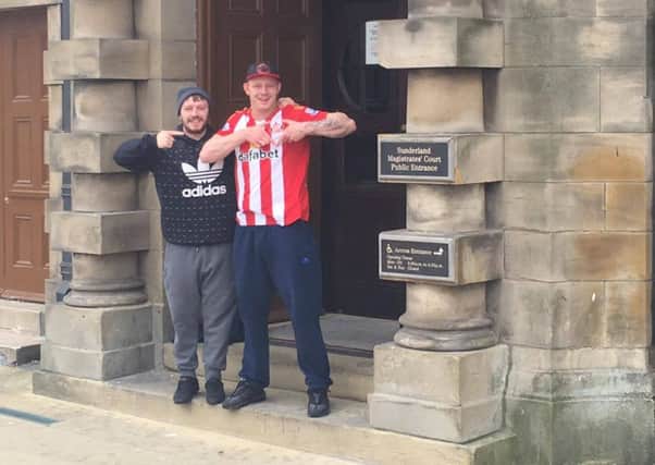 Alan and Ben Appleby celebrating outside of court after not getting banned from the Stadium of Light
