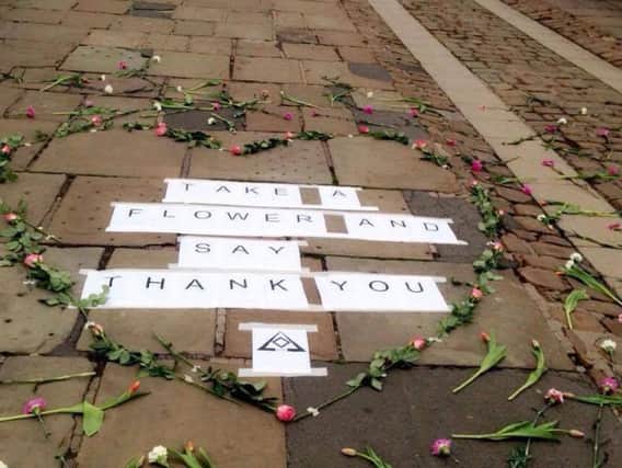 Flowers and a message are left on Elvet Bridge in Durham.