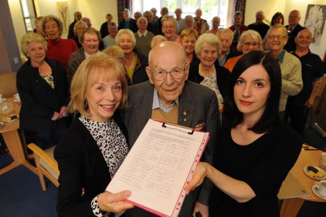 MP Bridget Phillipson receives petition from resident Tom Seamarks, centre, and Coun Gillian Galbraith, left, at Oakfield Court, Herrington, Sunderland.