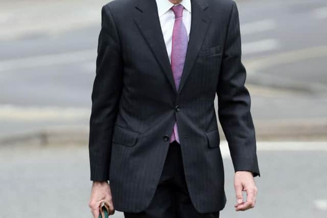 Coroner Brian Barker QC as he arrived at Woking Coroner's Court in Surrey.