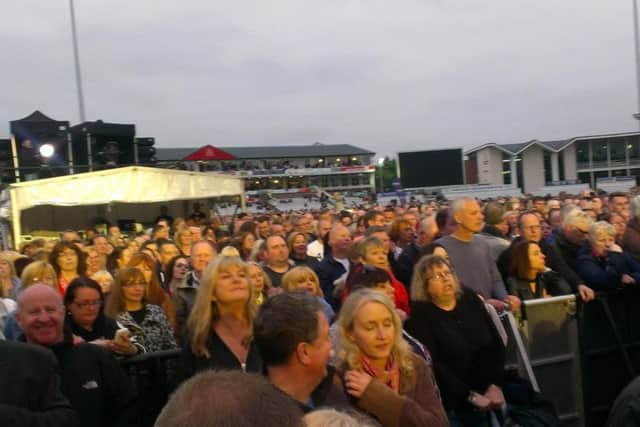 Simply Red fans gather at the cricket ground to see their favourite band in action