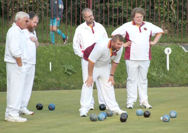 Thinking over a crucial bowl: From left, Billy Ferry, Gary McPheators, Gary Farquhar, Kevin Donkin and Jaxon McKenna survey the scene in their all-Silksworth triples green final at Barnes Park