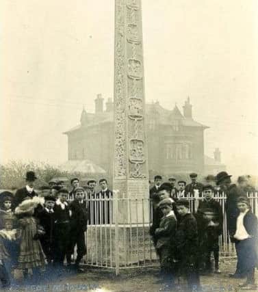 Admiring the Bede Memorial in 1904.