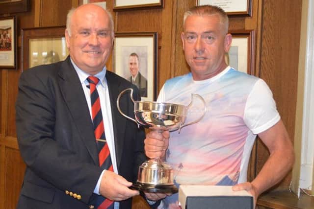 Wearside League chairman Peter Maguire presents the Respect award to Richmond Town manager Chris Lax