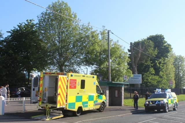 Ambulance crews at the scene of Sunday's accident.