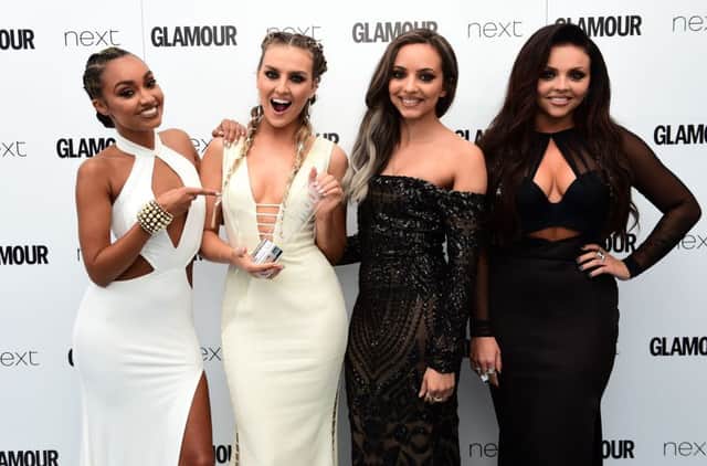 Little Mix's Leigh-Anne Pinnock, Perrie Edwards, Jade Thirlwall and Jesy Nelson with the Music Act Award in the press room at the Glamour Women of the Year Awards 2016, Berkeley Square Gardens, London. Photo. : Ian West/PA Wire