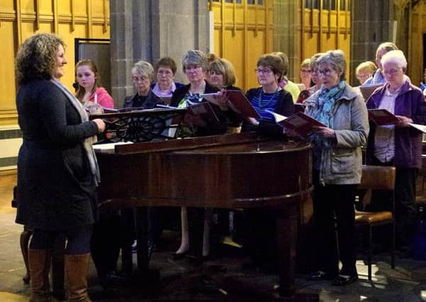 Voice coach Pippa Anderson working with some of the members of Bishopwearmouth Choral Society.