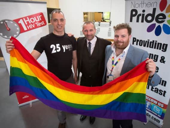 From left, John Lawson of MESMAC, Mark Nichols, Chair of Northern Pride  and Ste Dunn of Barclays.