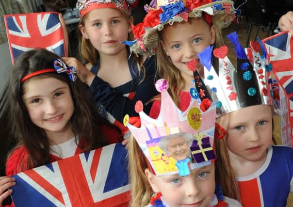 Brownies and Rainbows, Grace McCartney, Myah Wilson, Maisie Gamblin, Isabel Key and Stephanie Little of 19th Sunderland St Gabriel's unit celebrate the Queen's 90th birthday with an indoor street party.
