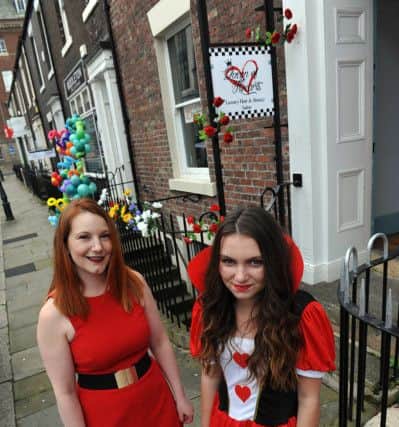(left to right) Owner Kiri Mitchelmore and model Rebecca Hewitson (14) at the opening of the Queen of Hearts salon in Frederick Street. Photograph by FRANK REID