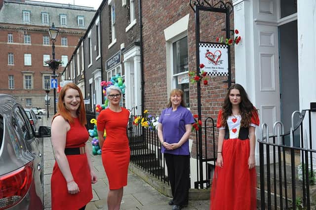 (left to right) Owner Kiri Mitchelmore with Charlotte Thompson, Sharon Greener and model Rebecca Hewitson (14) at the opening of the Queen of Hearts salon in Frederick Street. Photograph by FRANK REID