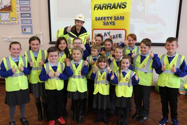 'Safety Sam' Samantha Stirling  gives a talk on building site safety to children at South Hylton Primary School, Sunderland.