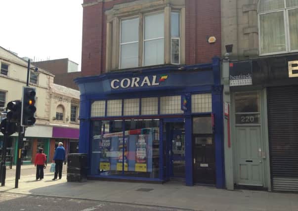 Coral Bookmakers' on the corner of John Street and High Street West, Sunderland.