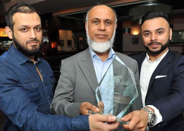 (left to right) Mohammad Jaber Ahmed with Syed Amir Ali (Owner) and Syed Jay Islam winners of Curry House of the Year Alishaan of Durham. Photograph by FRANK REID