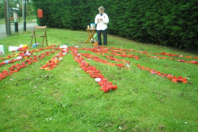 Some of the completed poppies, which will be hung over the bridge.