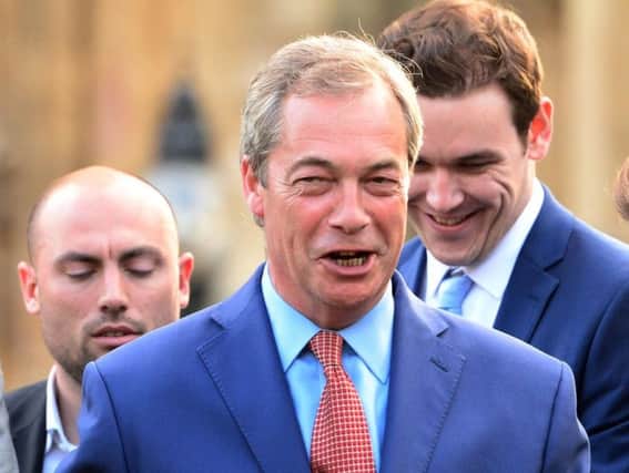 Ukip leader Nigel Farage greets his supporters at Westminster after Britain voted to leave the European Union. Pic: PA.