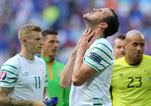 John O'Shea suffers at the final whistle after Ireland's Euro 2016 adventure was ended by France yesterday